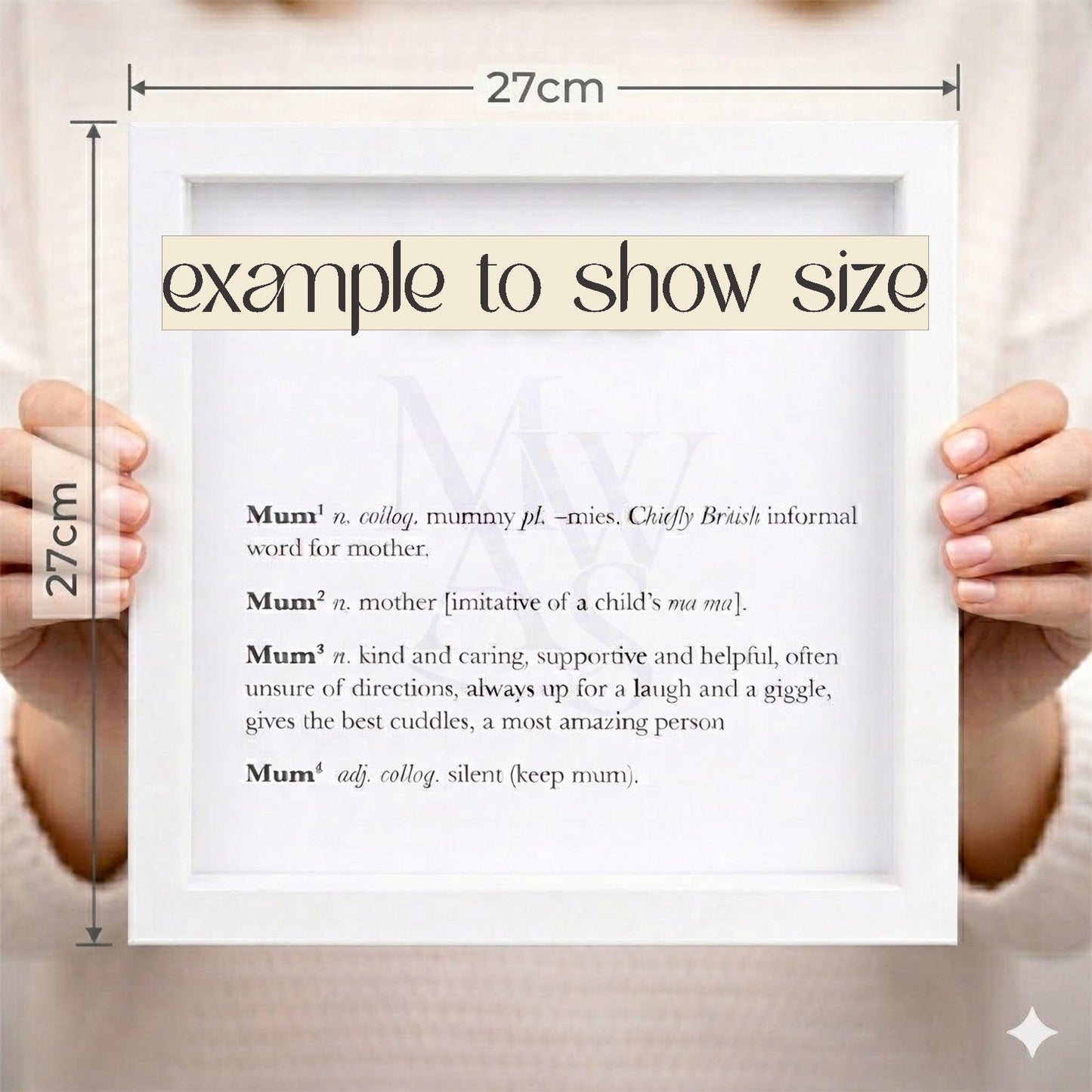 27cm x 27cm white box frame shown held in hands for size reference