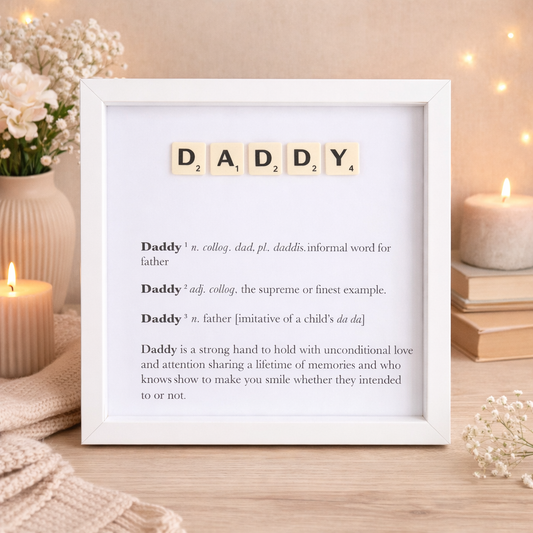 Framed decorative picture with 'DADDY' spelled out using tiles, with the meaning of daddy in text below 