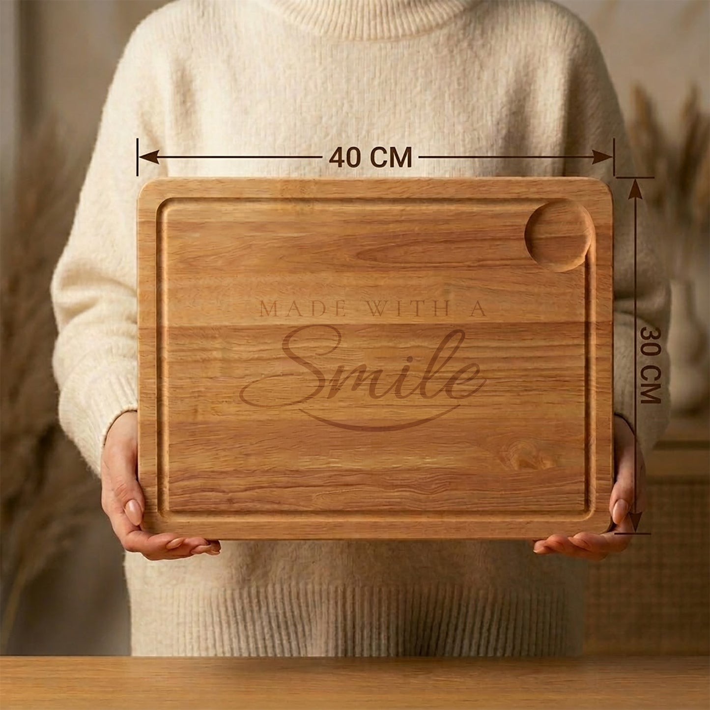 Wooden cutting board with 'Made with a Smile' engraving held by a person, showing dimensions.