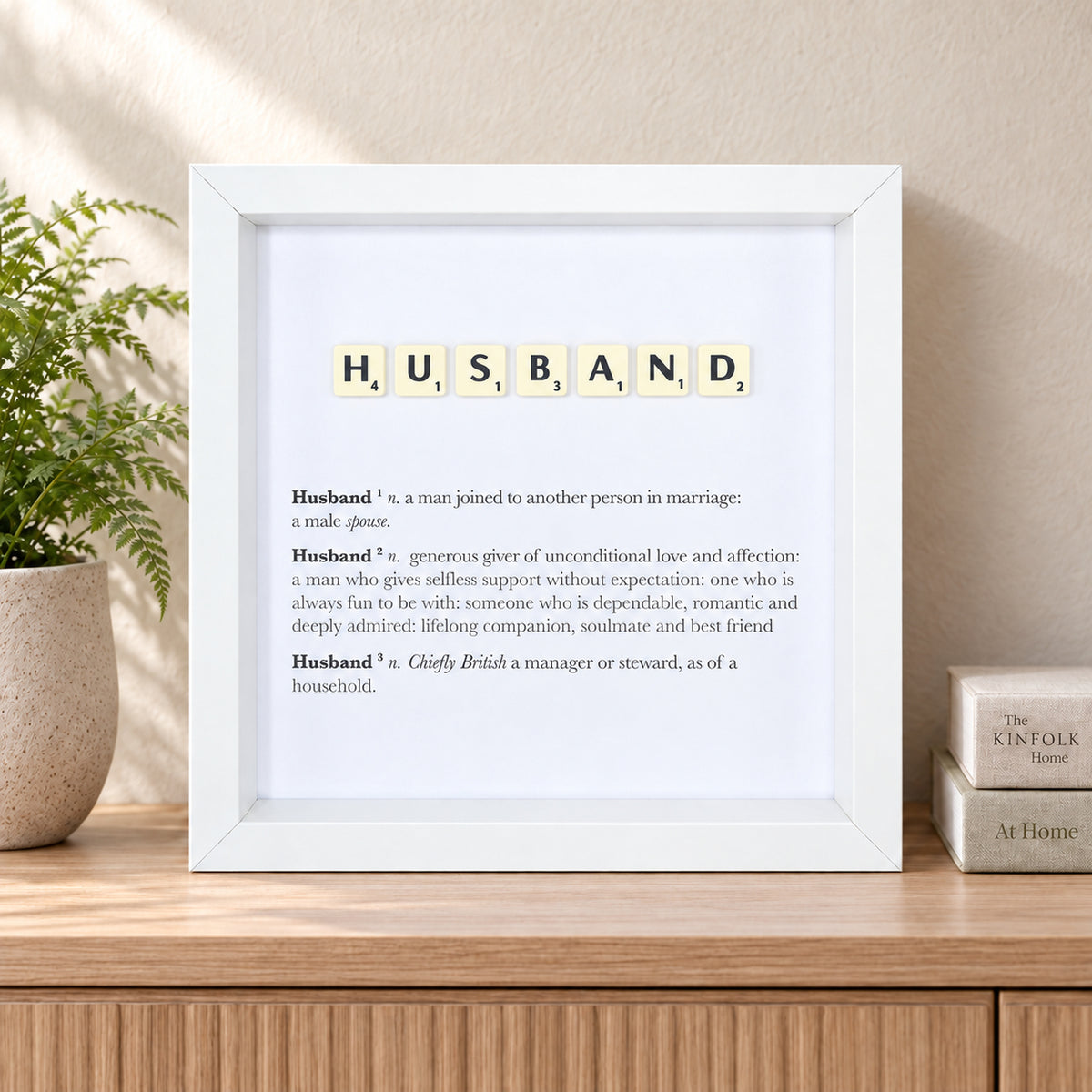 Husband Scrabble-style definition frame displayed in a styled home interior