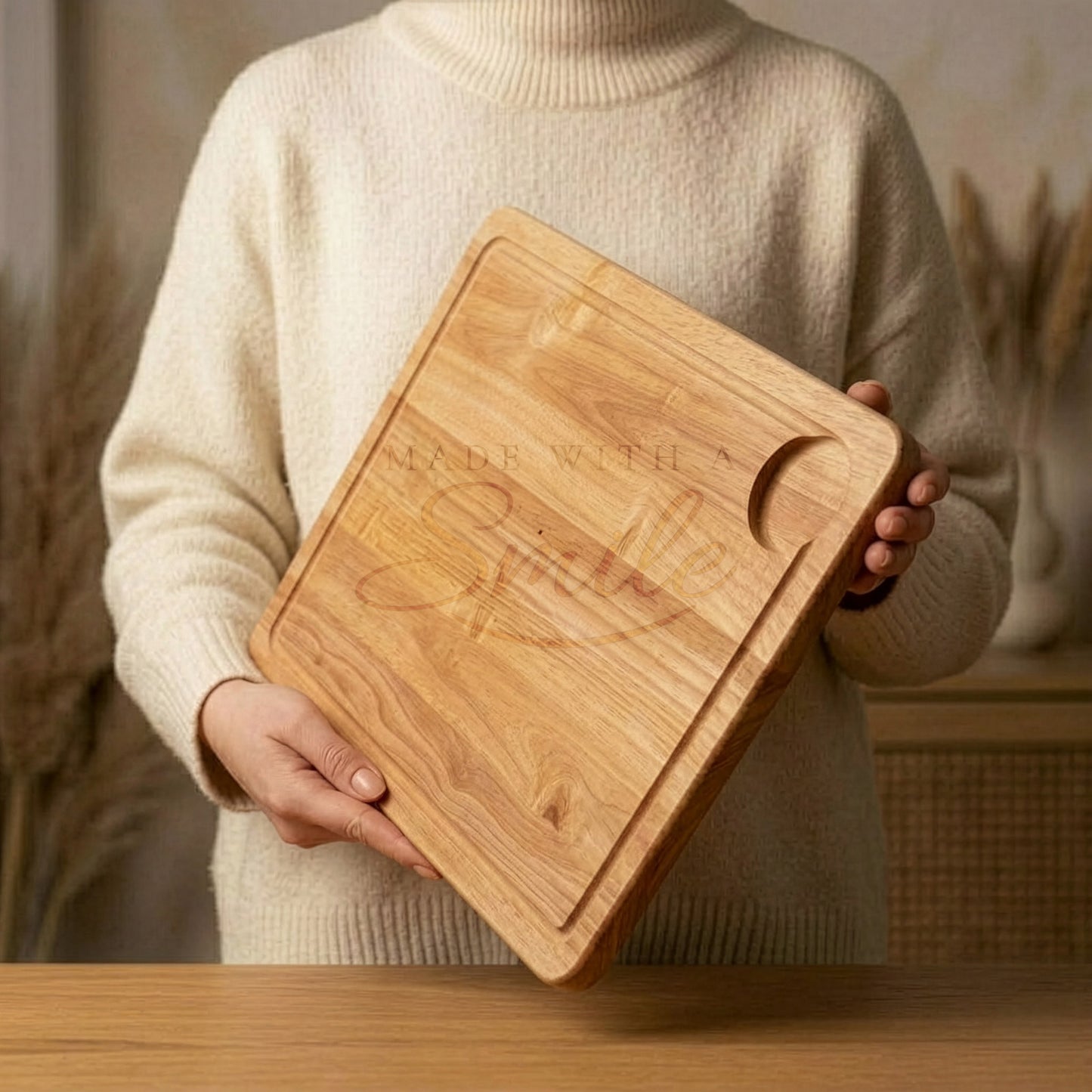 Person holding a made with a smile wooden cutting board highlighting the depth 