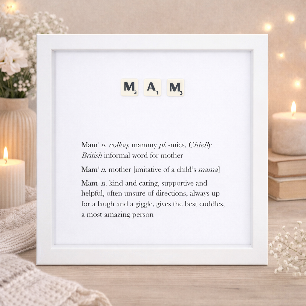 Mam definition boxed frame with Scrabble-style letter tiles and dictionary-style description in white deep frame on wooden background