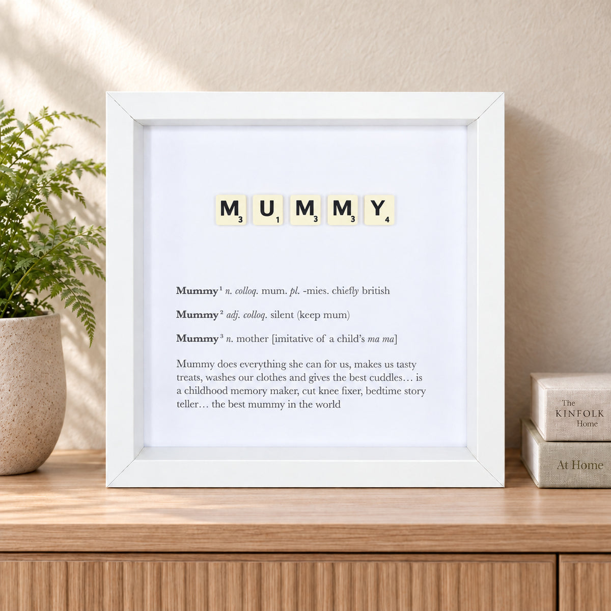 Mummy Scrabble-style definition frame displayed in a styled home interior
