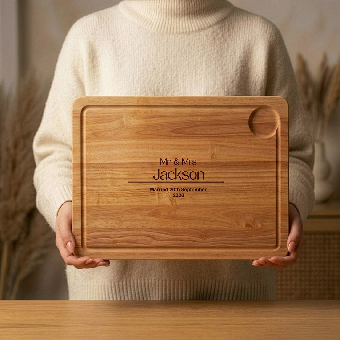 Personalised Mr & Mrs Wedding Chopping board being held in the hands of a lady